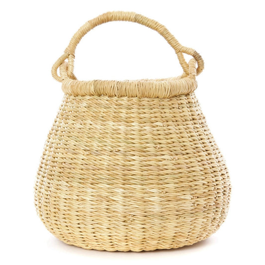 Tan woven kettle basket with pear shaped bottom and swing handle.