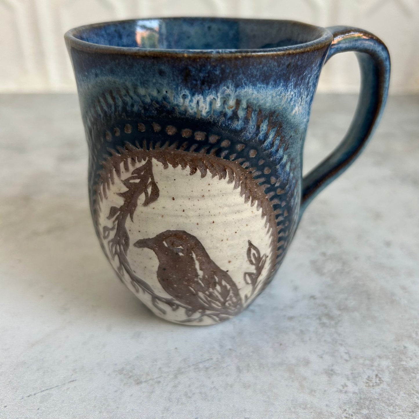 Waterfall & Bird Ceramic Mug by Danielle Payette