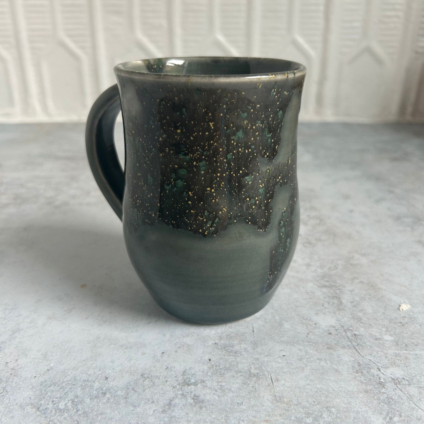Dark Green Speckle Porcelain Mug by Tori Fullard