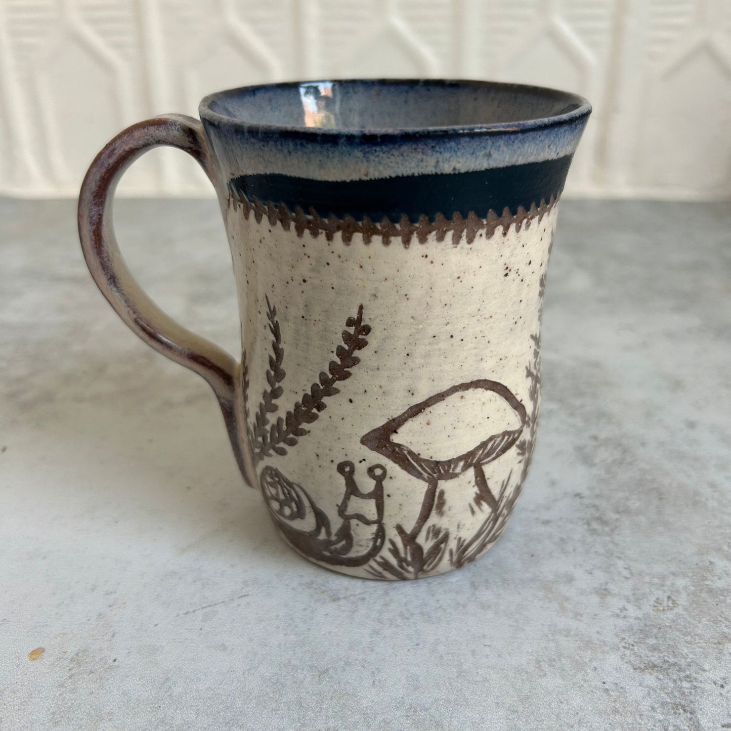 Mushroom & Snail Ceramic Mug by Danielle Payette