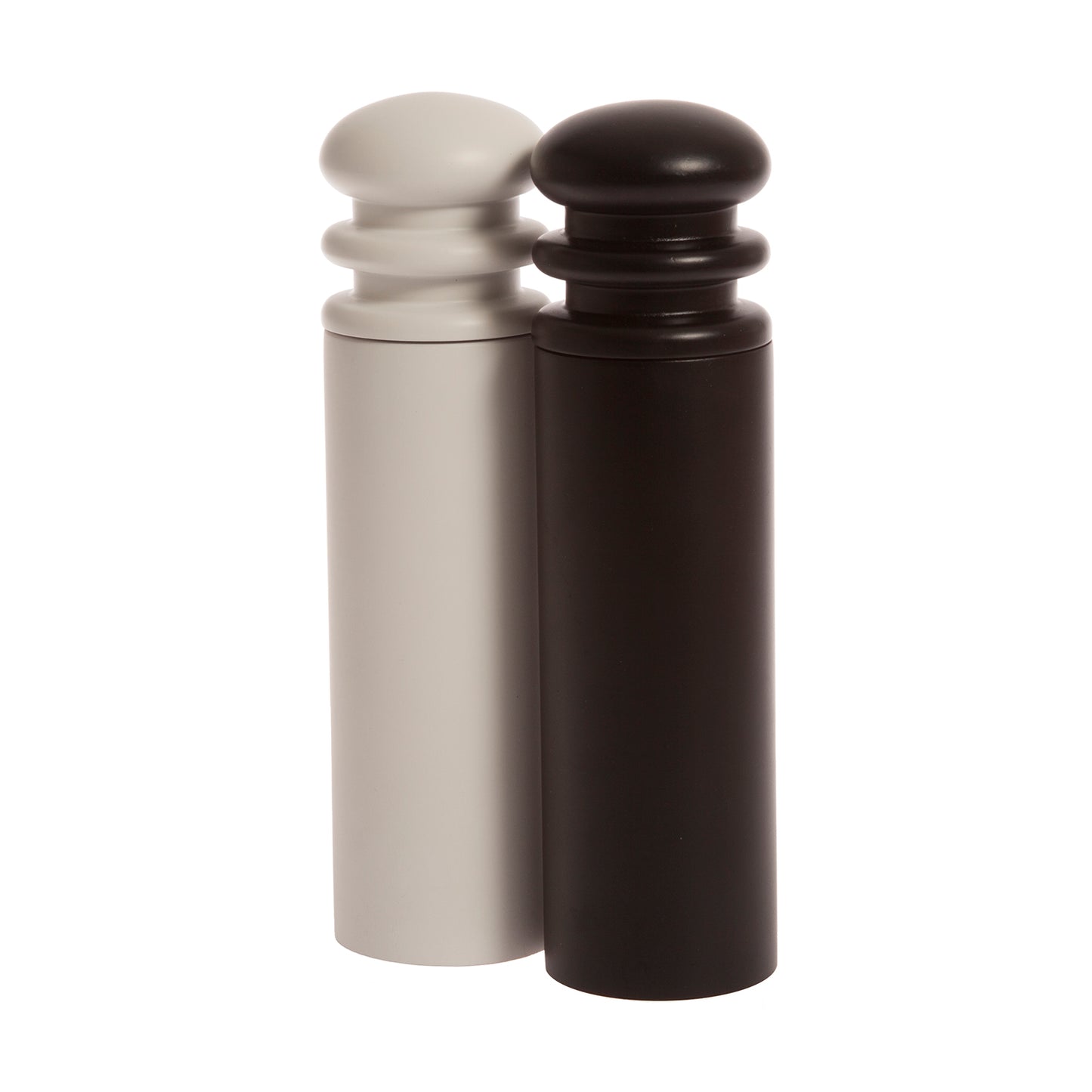 A black and a white salt or pepper mill grinder made of beechwood