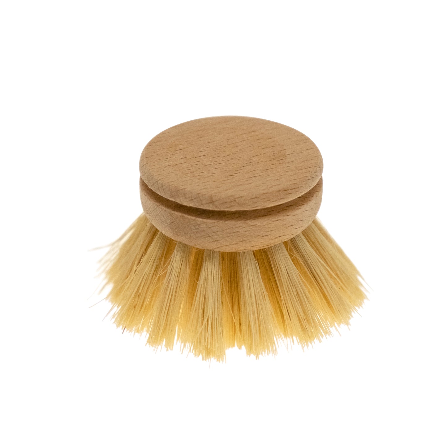 A beige dish brush replacement head made of beechwood and plant fiber, with no handle.