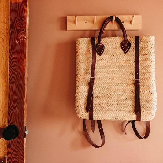 Example of the rail hanging rack with 4 peg hooks with a bag hanging on it