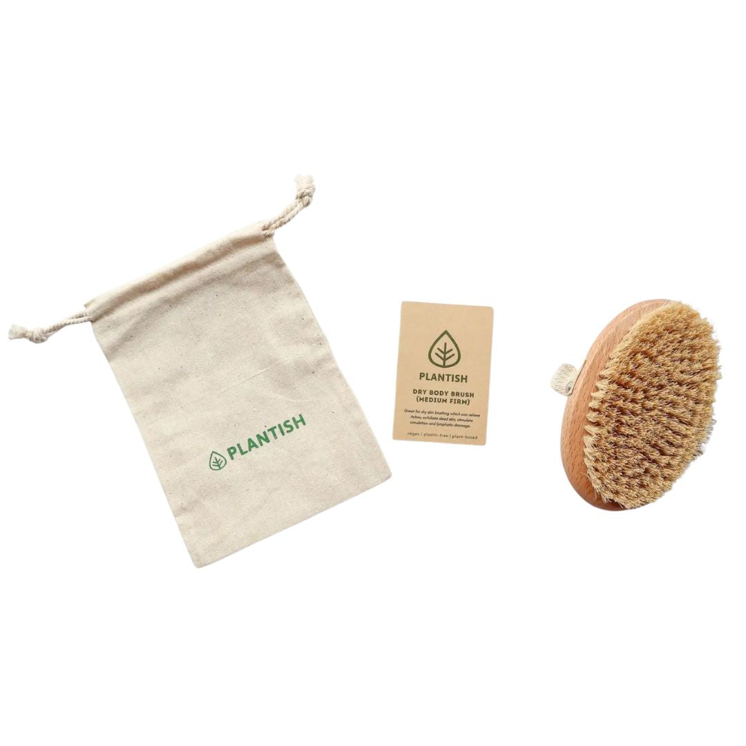 Dry body brush, drawstring storage bag, and instruction booklet