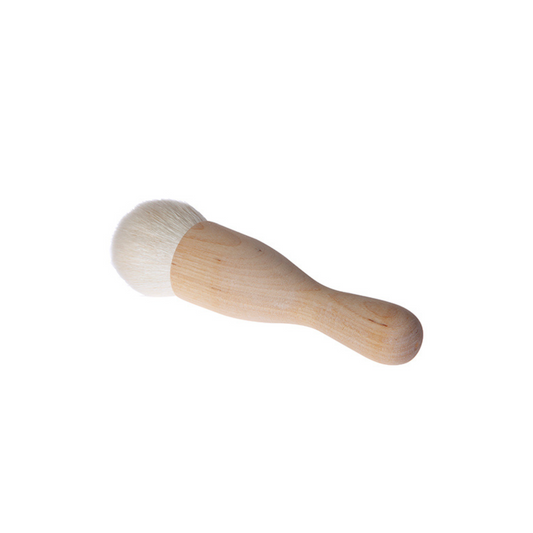 A goat hair and oiled birch wood makeup brush