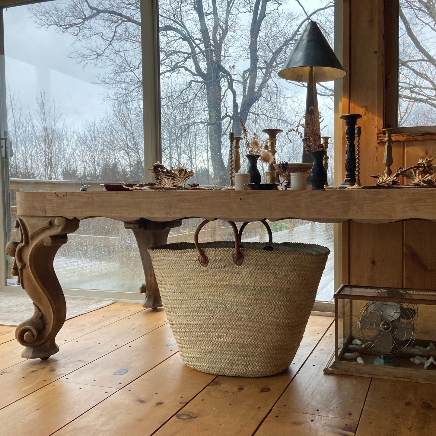 large storage basket under a table