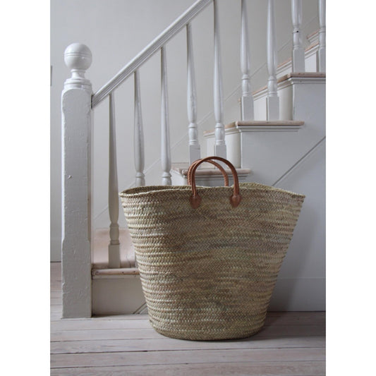 basket at bottom of stairs