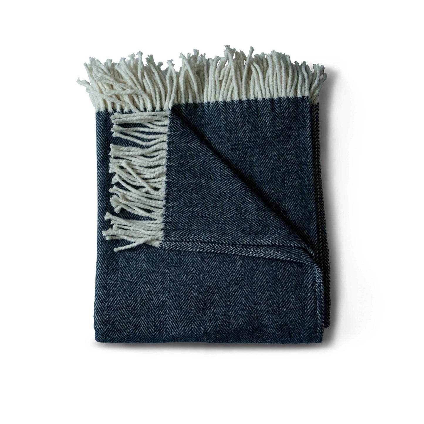 Brushed cotton throw blanket in dark navy blue herringbone pattern with cotton fringe