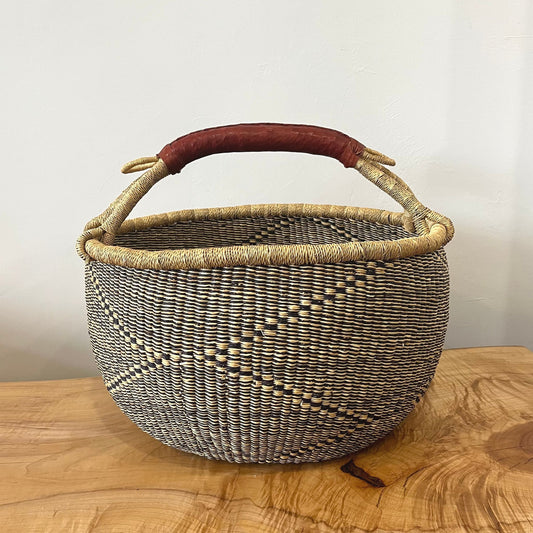 15-inch handwoven Bolga basket with leather handle in indigo and natural geometric pattern