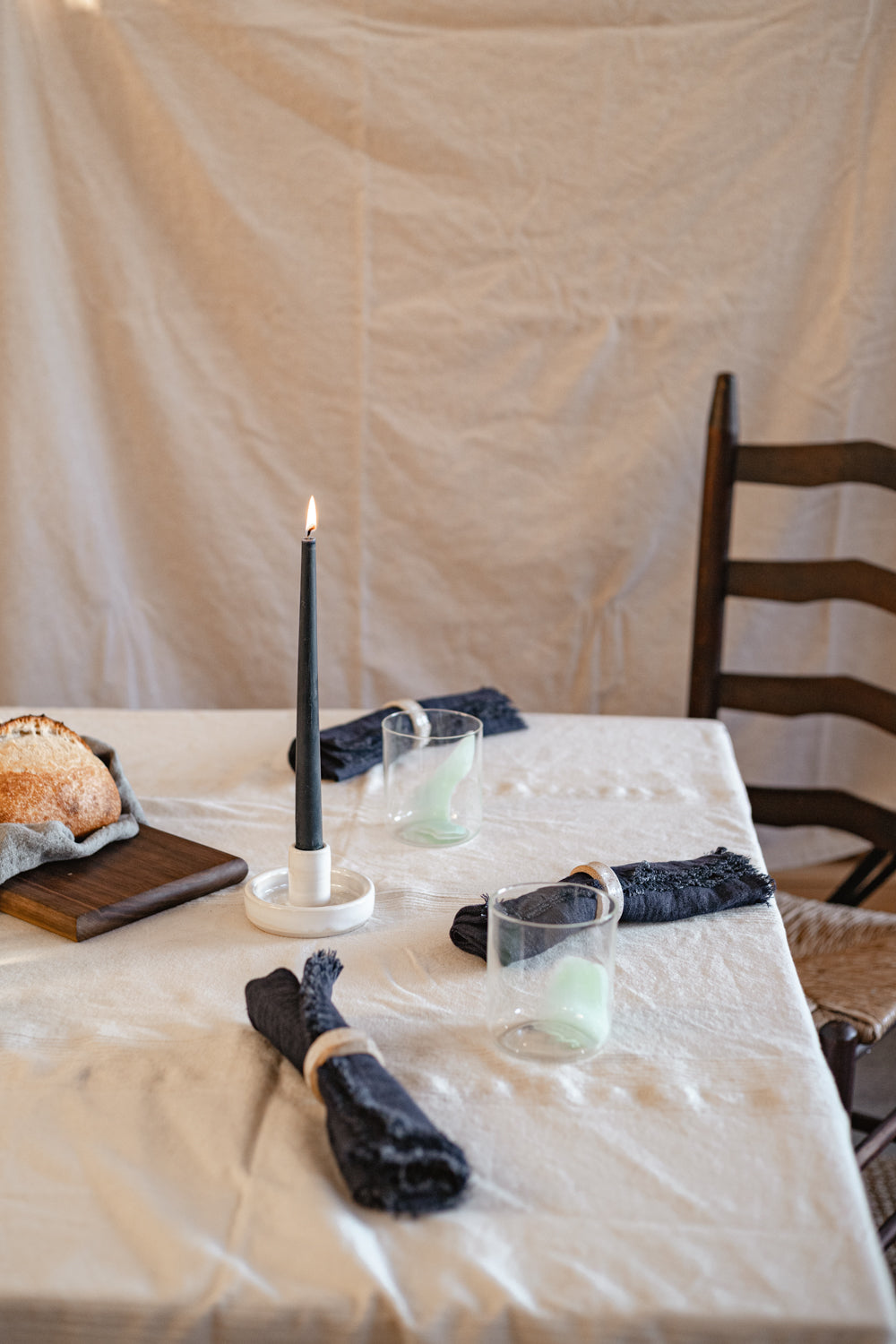 10-inch tall smooth taper candle shown in dinner table setting