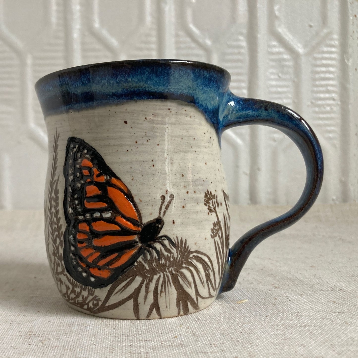 Butterfly and Flowers Ceramic Mug by Danielle Payette