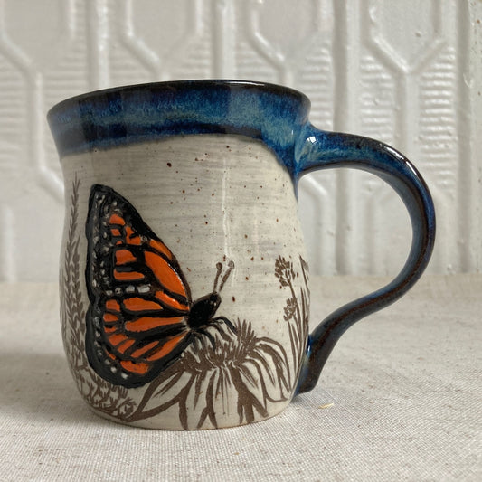 Butterfly and Flowers Ceramic Mug by Danielle Payette