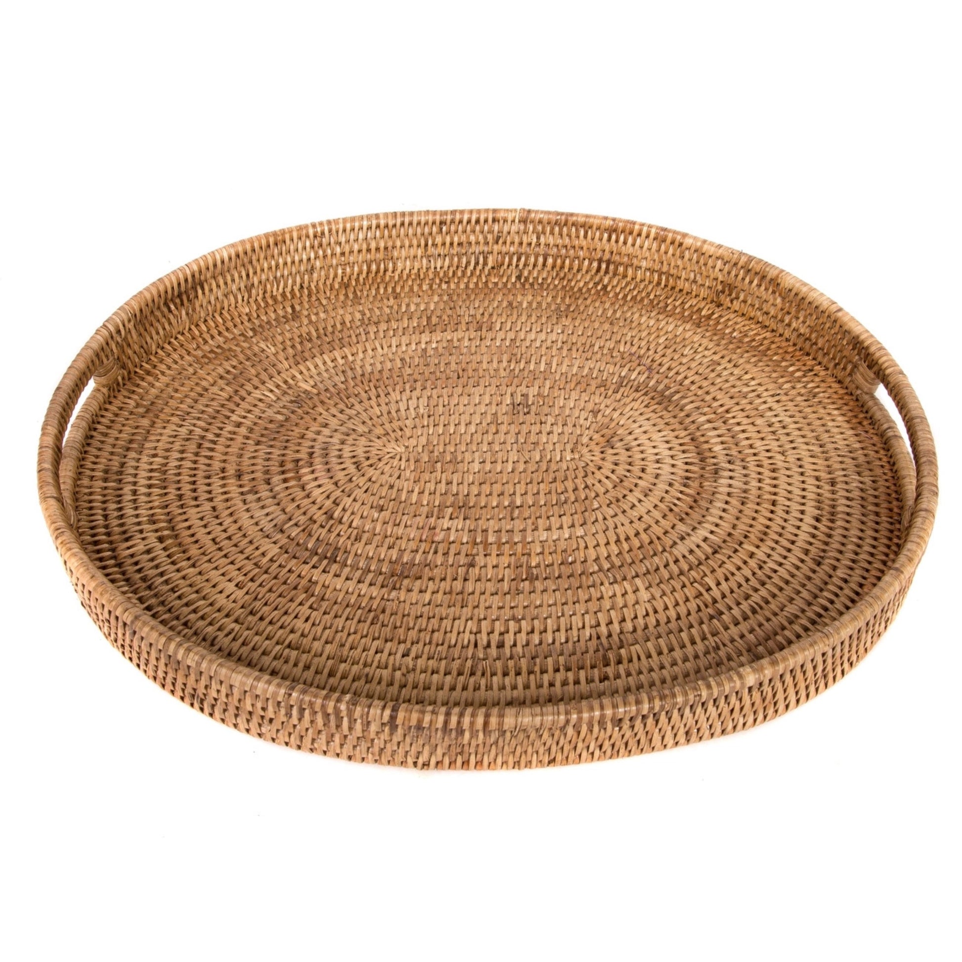 Round woven rattan tray on a white background