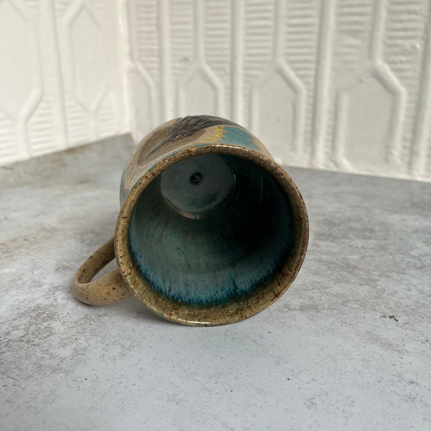 Crow with Flower Meadow Ceramic Mug by Danielle Payette