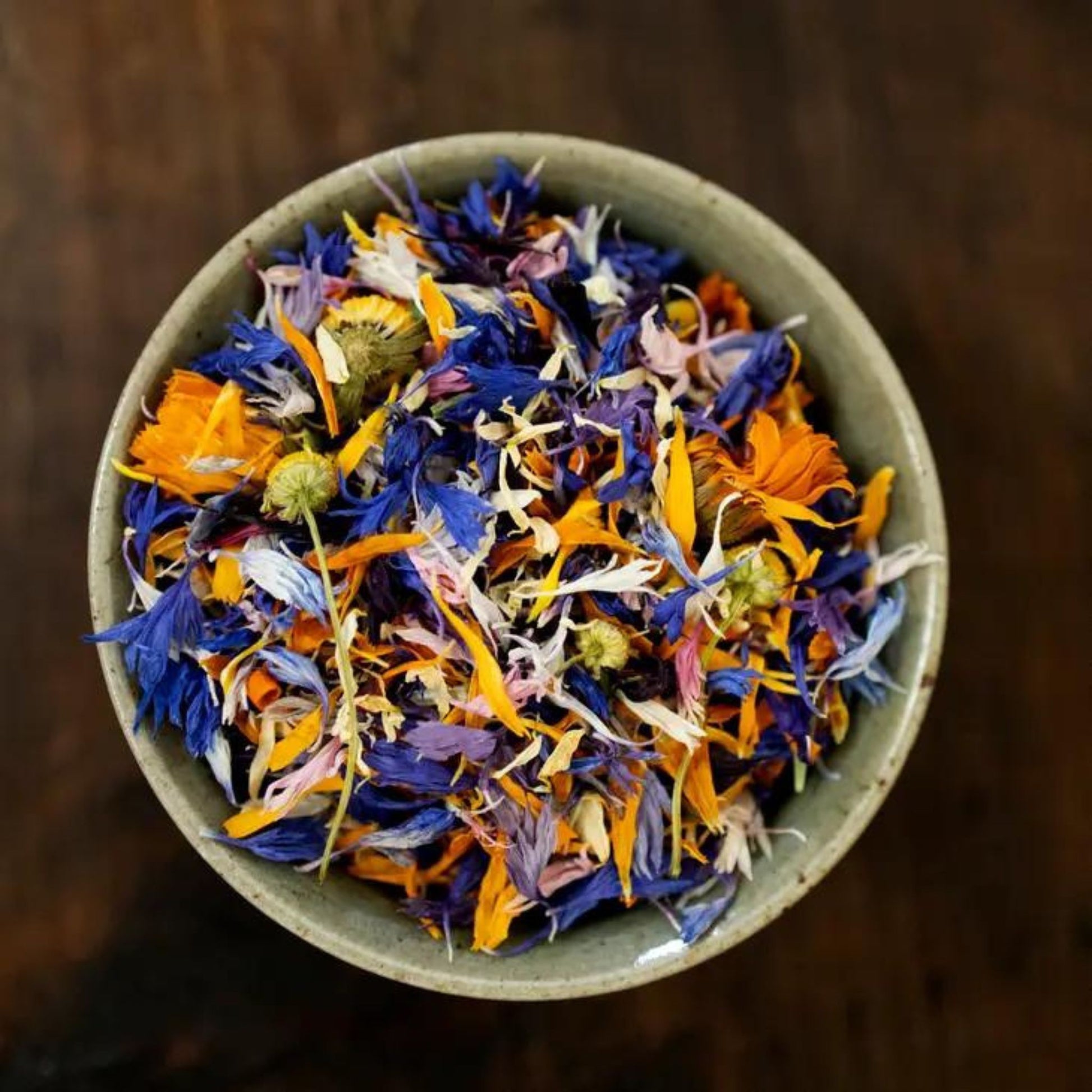edible dried flower in a ceramic bowl
