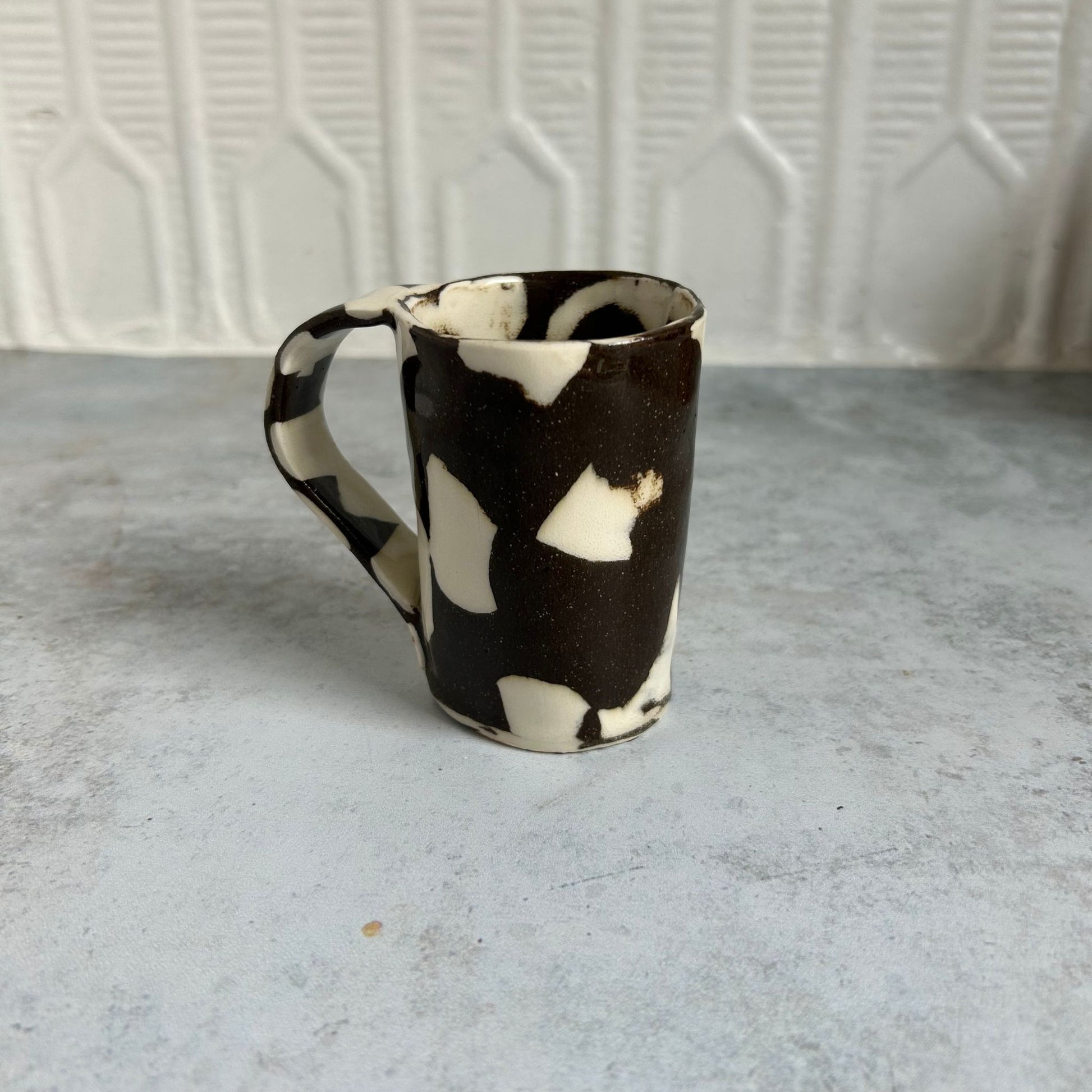 Brown and white espresso mug.