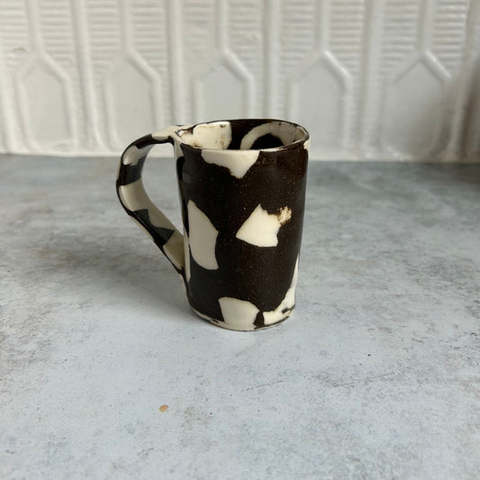 Brown and white espresso mug.