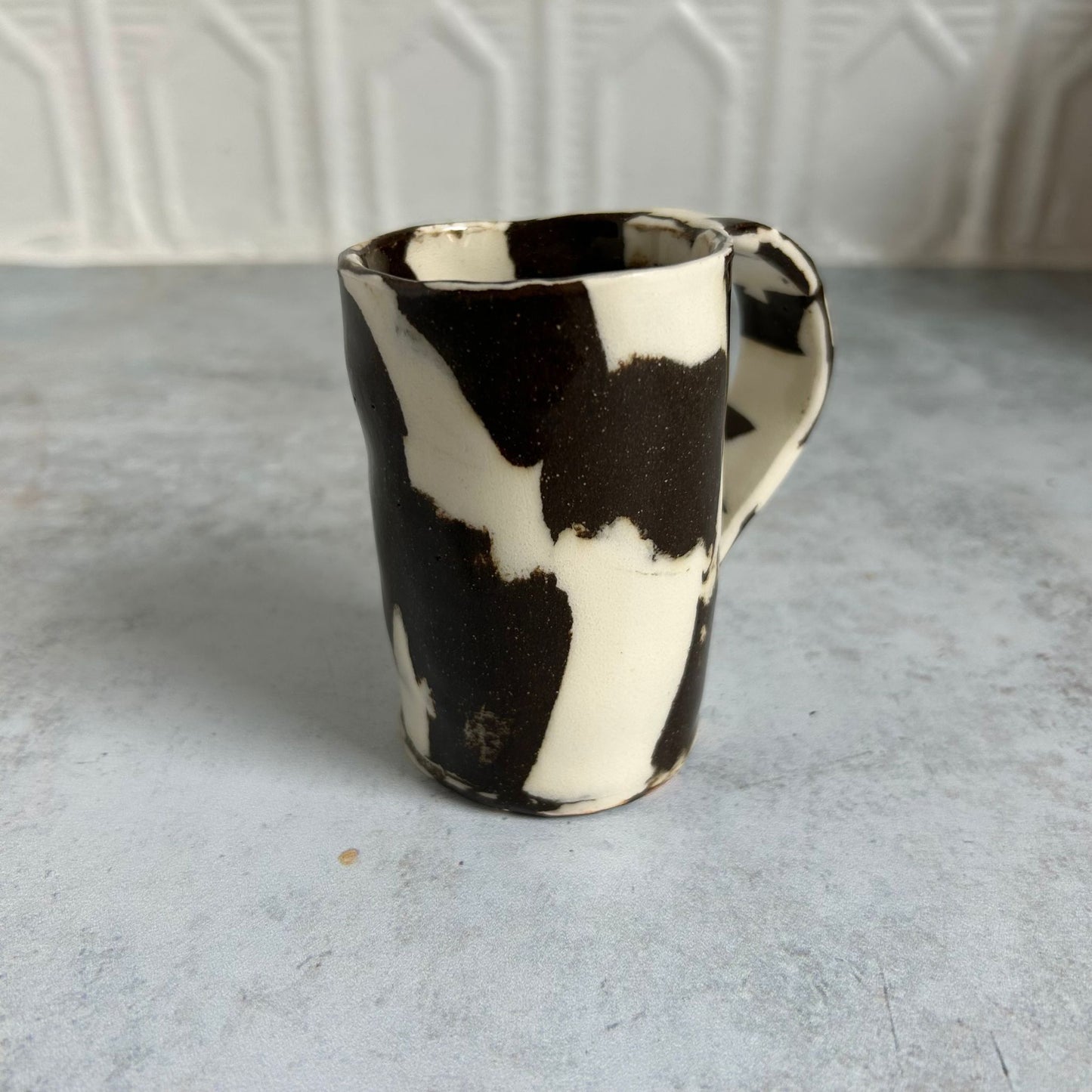 Brown and white espresso mug.