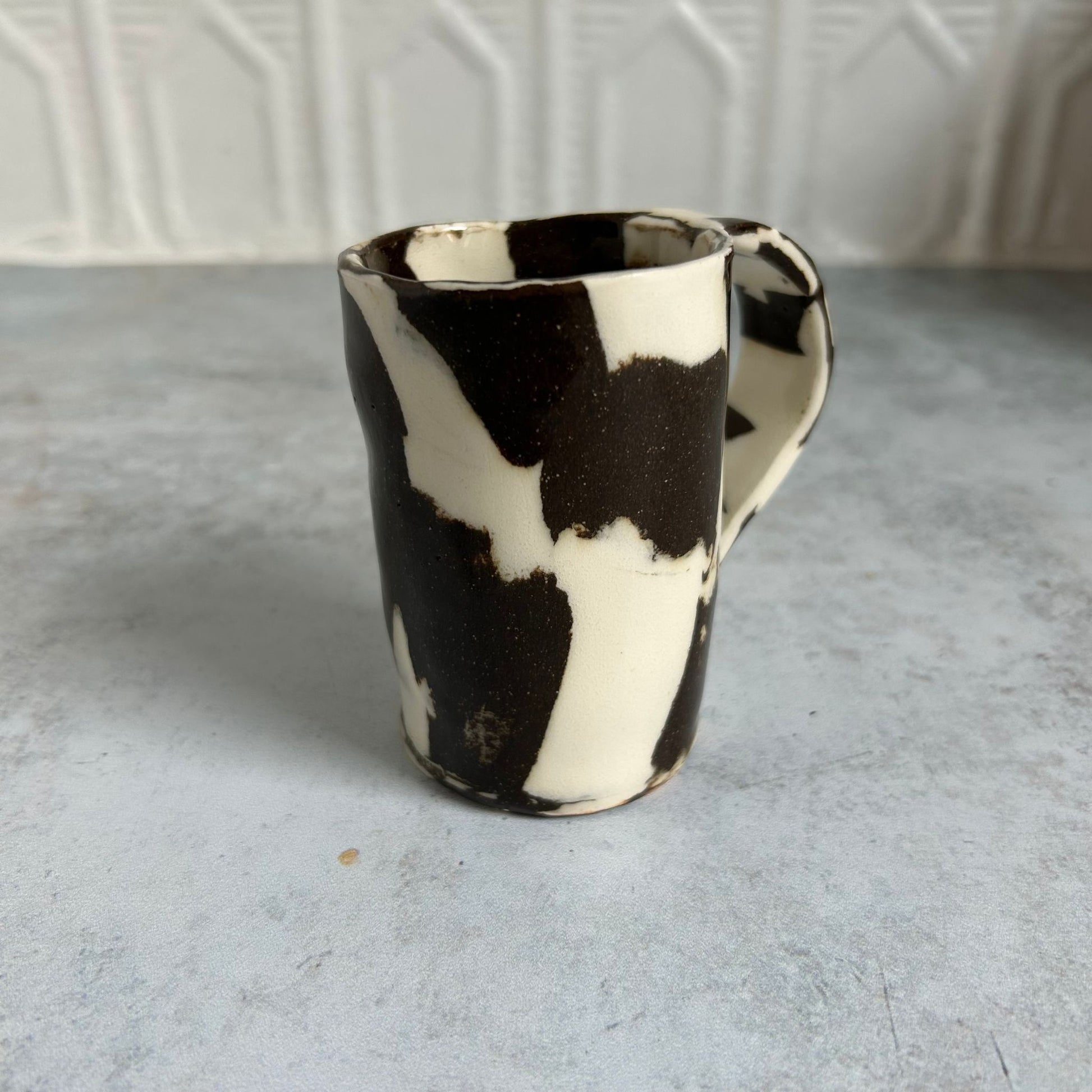 Brown and white espresso mug.