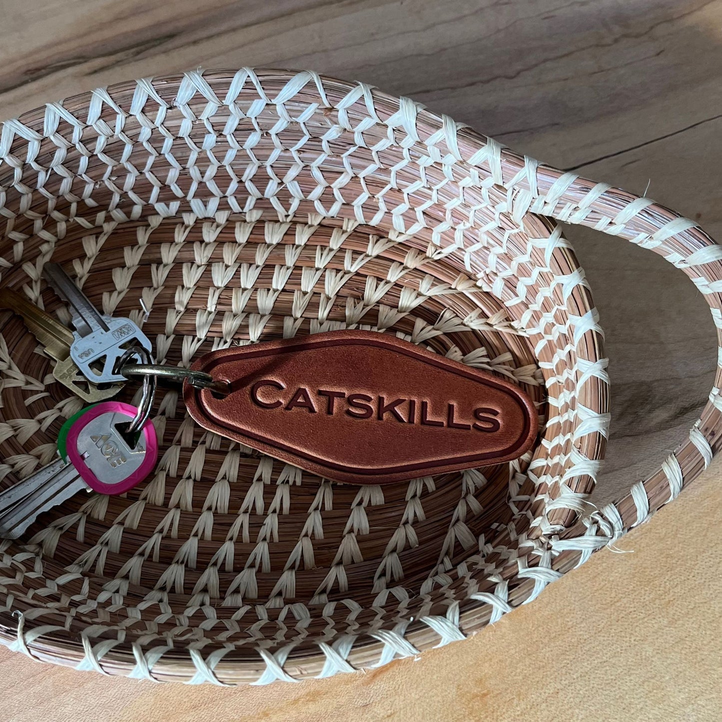 Catskills Leather Keychain in a Pine basket 