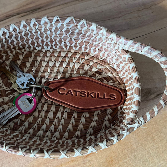 Catskills Leather Keychain in a Pine basket