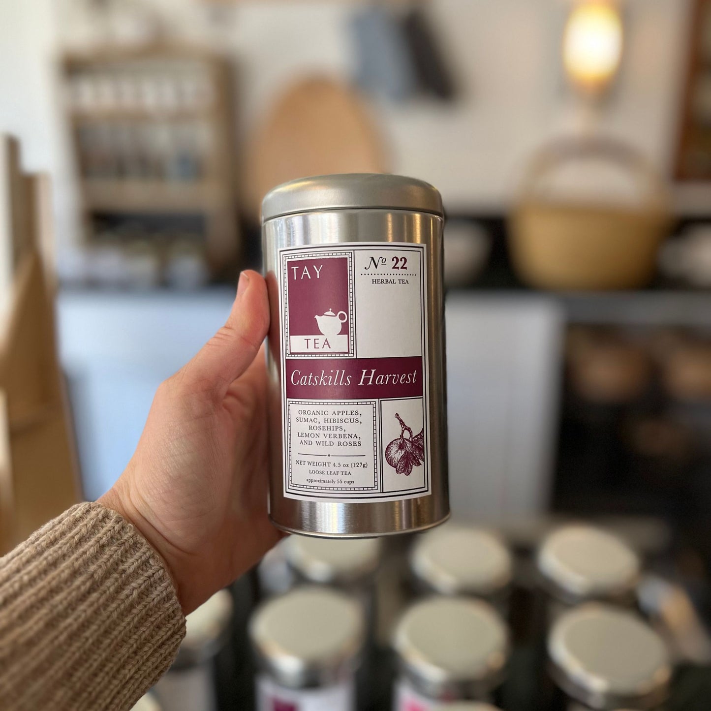 Catskills Harvest Wellness Tea from Tay Tea is an organic caffeine-free herbal blend, inspired by the bounty of the Catskill Mountains, consists of apple, sumac, rosehips, hibiscus, lemon verbena, and wild roses. 4 oz of loose tea is packaged in a resealable tin.
