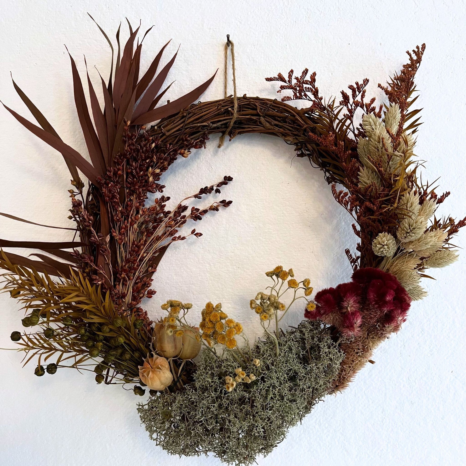 dried floral decorative wreath with eucalyptus and moss