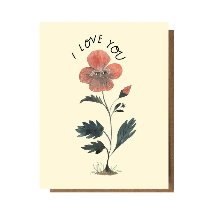 Folding card with illustration of a smiling flower with the word I LOVE YOU printed above