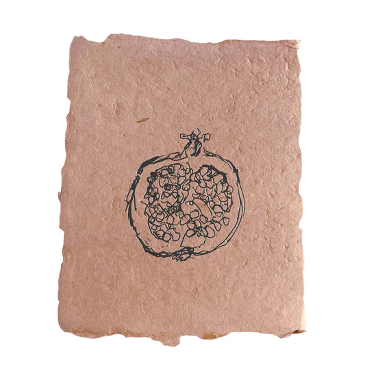 Handmade letterpress printed card featuring an illustration of a pomegranate half