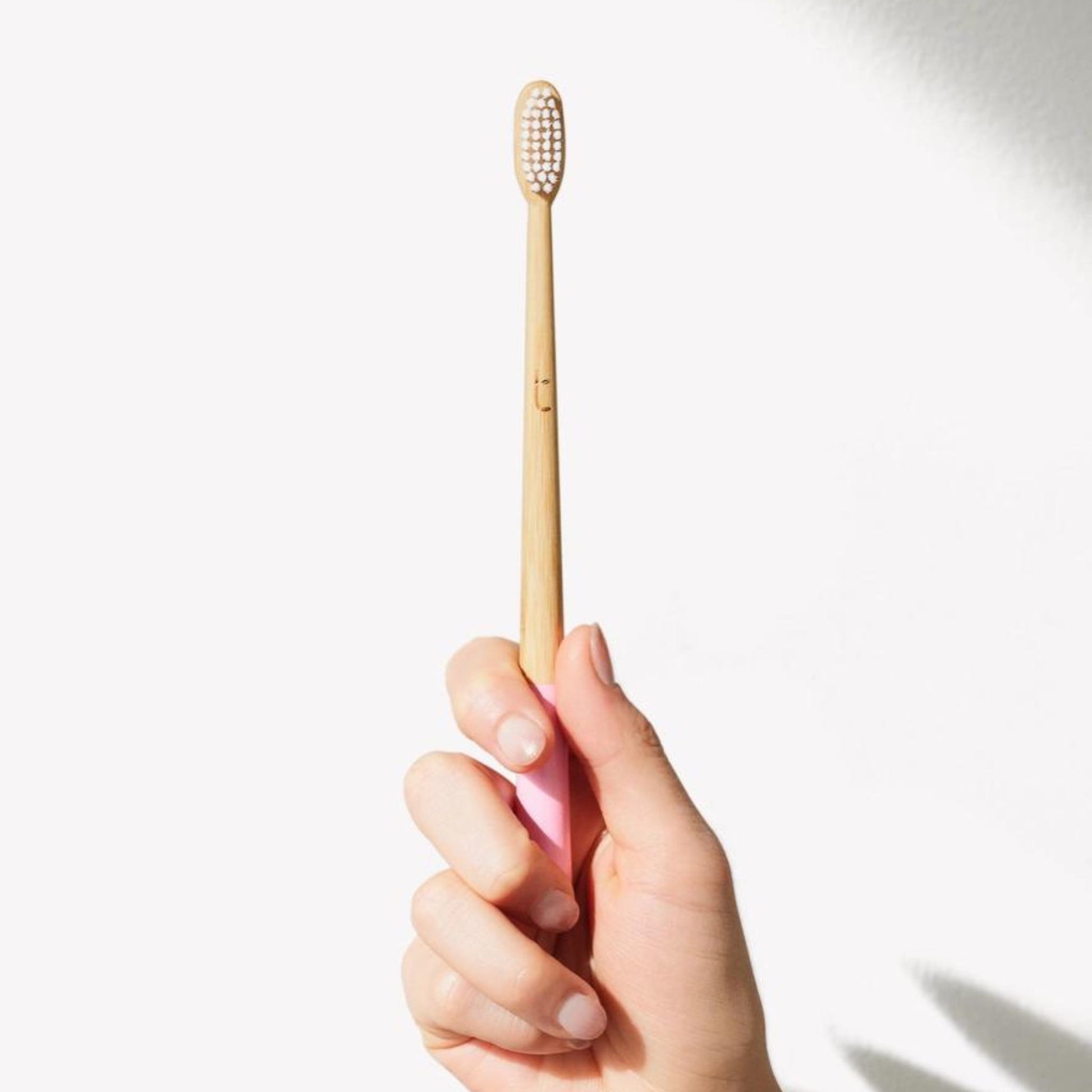 Bamboo toothbrush with Medium plant-based bristles in pink