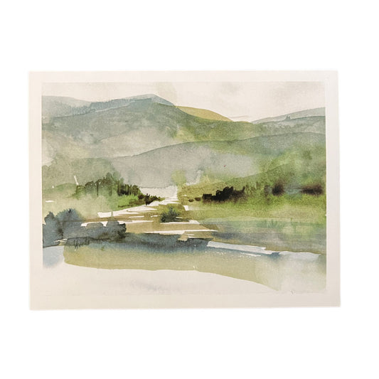 A blank greeting card depicting the Catskill mountains. This Hudson Valley artist, Laura Avello, creates this imagery by mixing watercolor and printmaking. Comes with a white envelope.