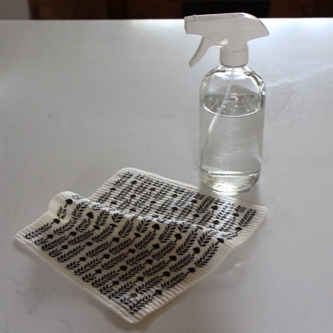Refillable 16-ounce clear glass spray bottle and Swedish dish cloth