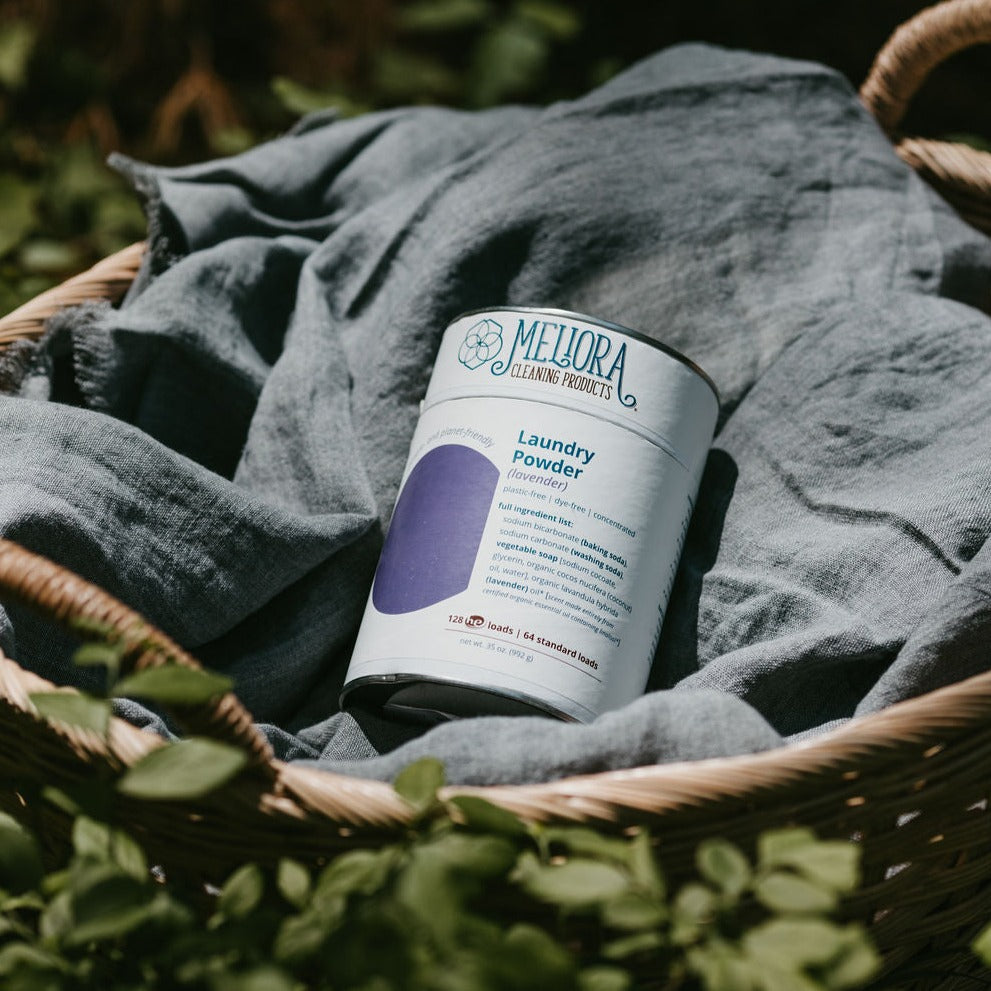 Lavender laundry powder shown in laundry basket