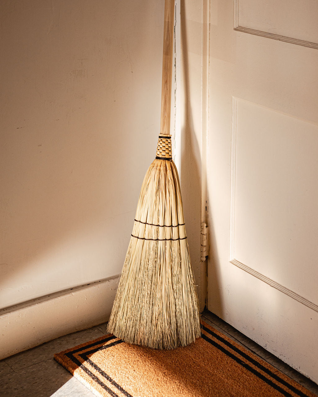 close up of full-length farmhouse broom