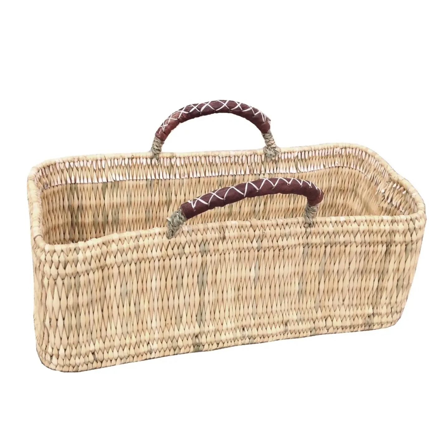 Narrow rectangular handled basket handmade in Morocco with ethically-sourced woven palm leaves and naturally tanned leather