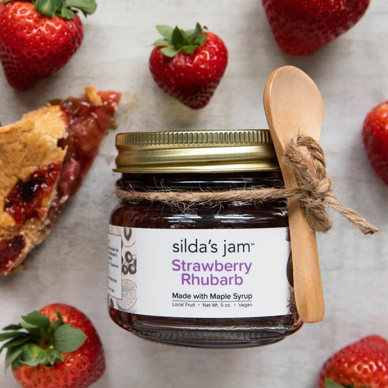 Jar of all-natural vegan Strawberry Rhubarb jam sweetened with maple syrup