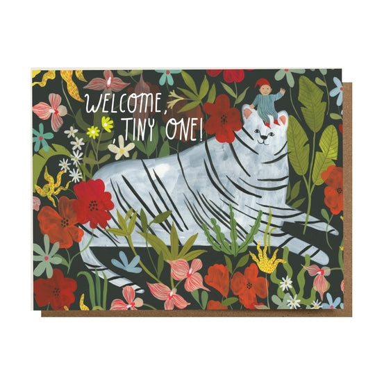 Folding card with illustration of baby on the head of white tiger in flowers Welcome Tiny One! written above