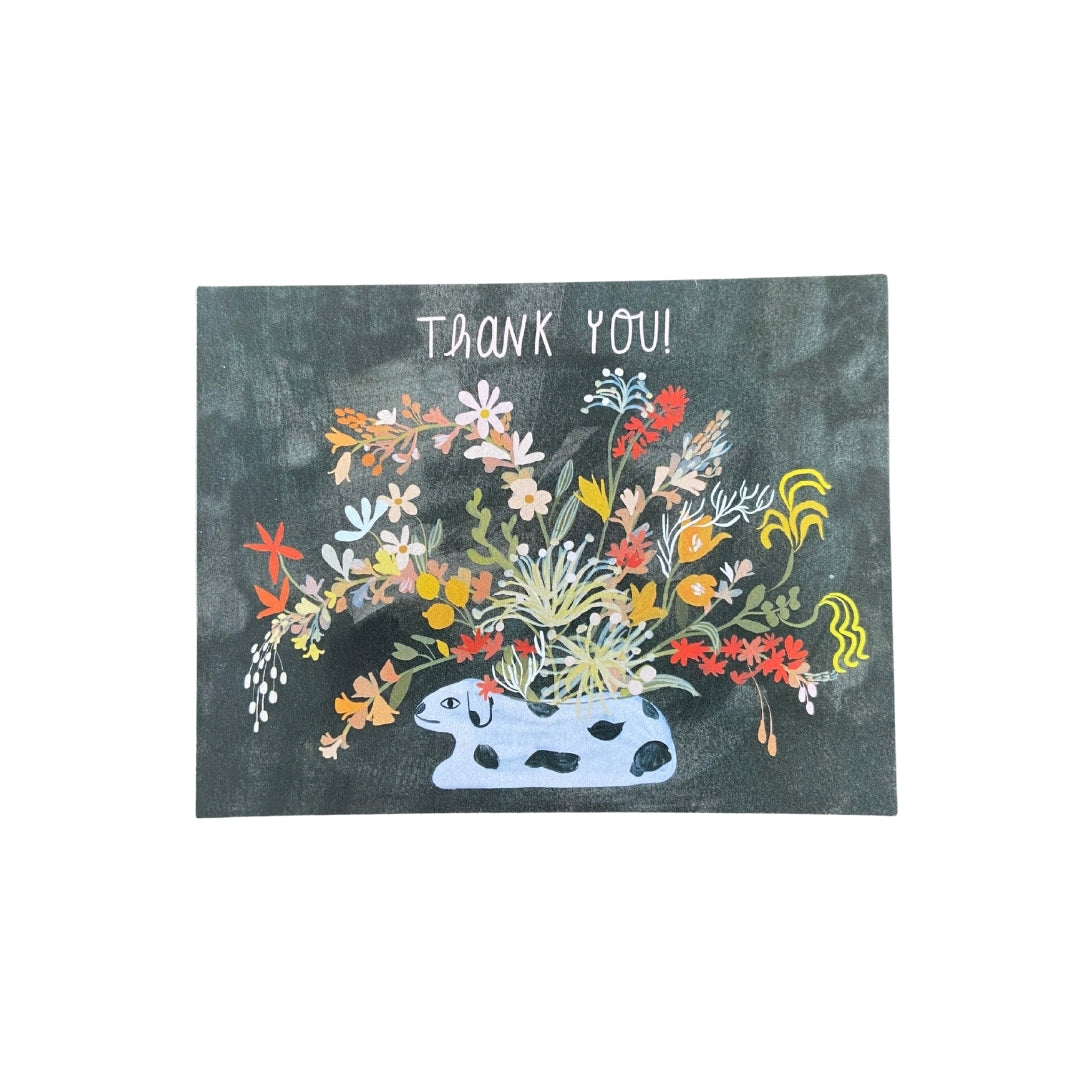 Folding card with illustration of flower bouquet and small dog Thank You! written above