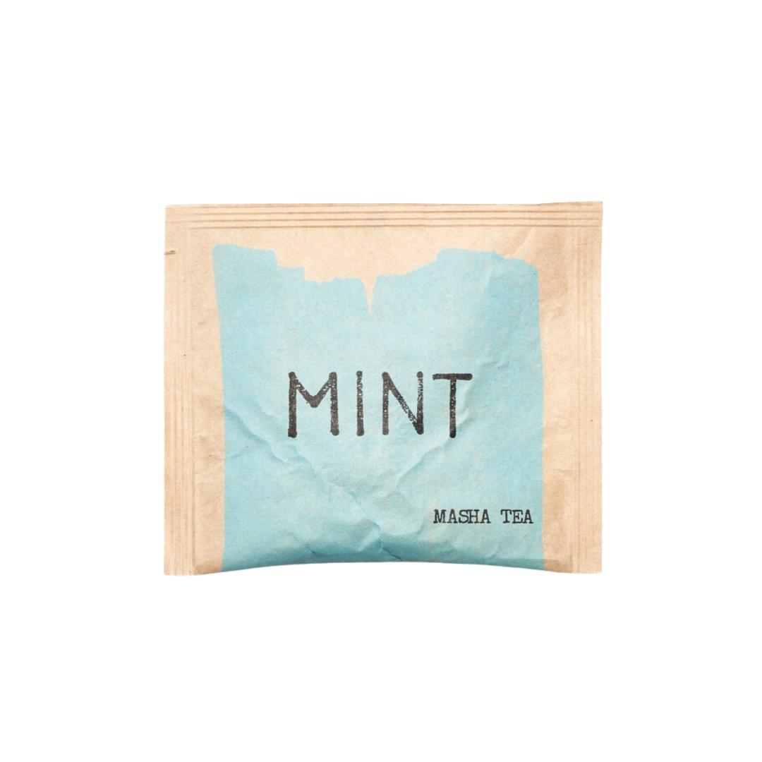 Organic mint tea sachet in sealed compostable envelopes