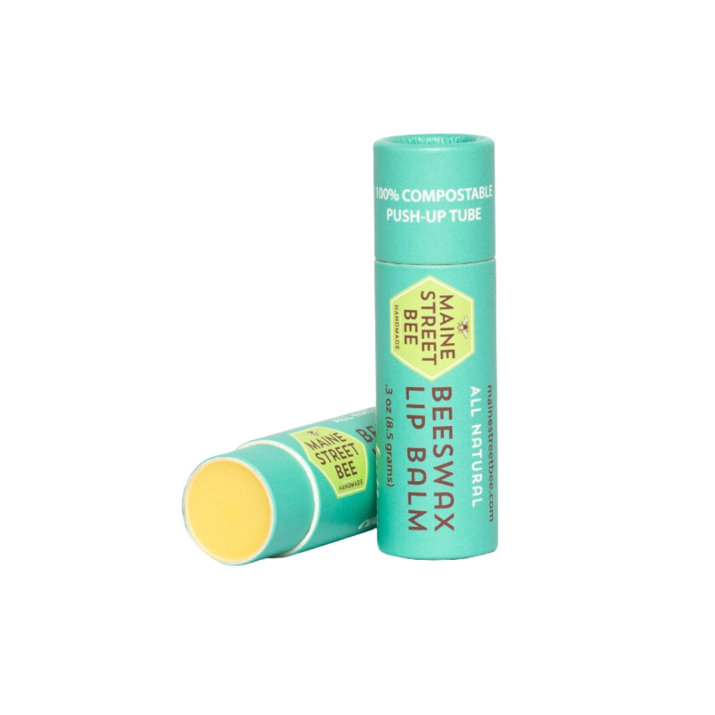 Organic lip balm in a compostable paper board tube made with beeswax, cocoa butter, and jojoba oil