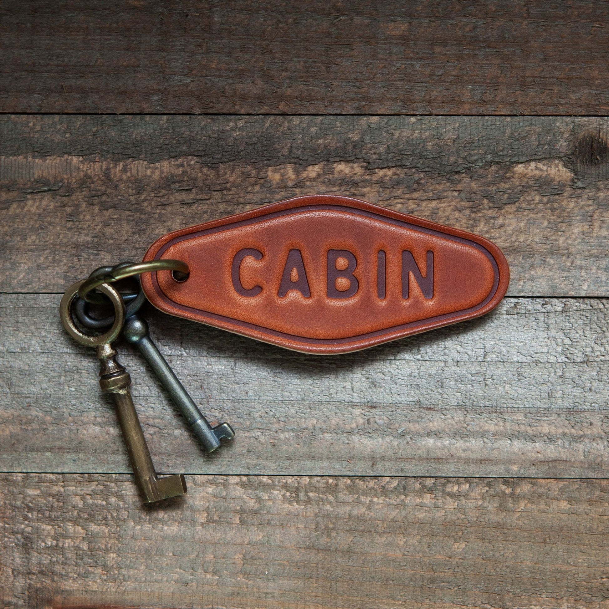 cabin leather keychain cut and pressed by hand from some of the thickest and finest harness leather available.