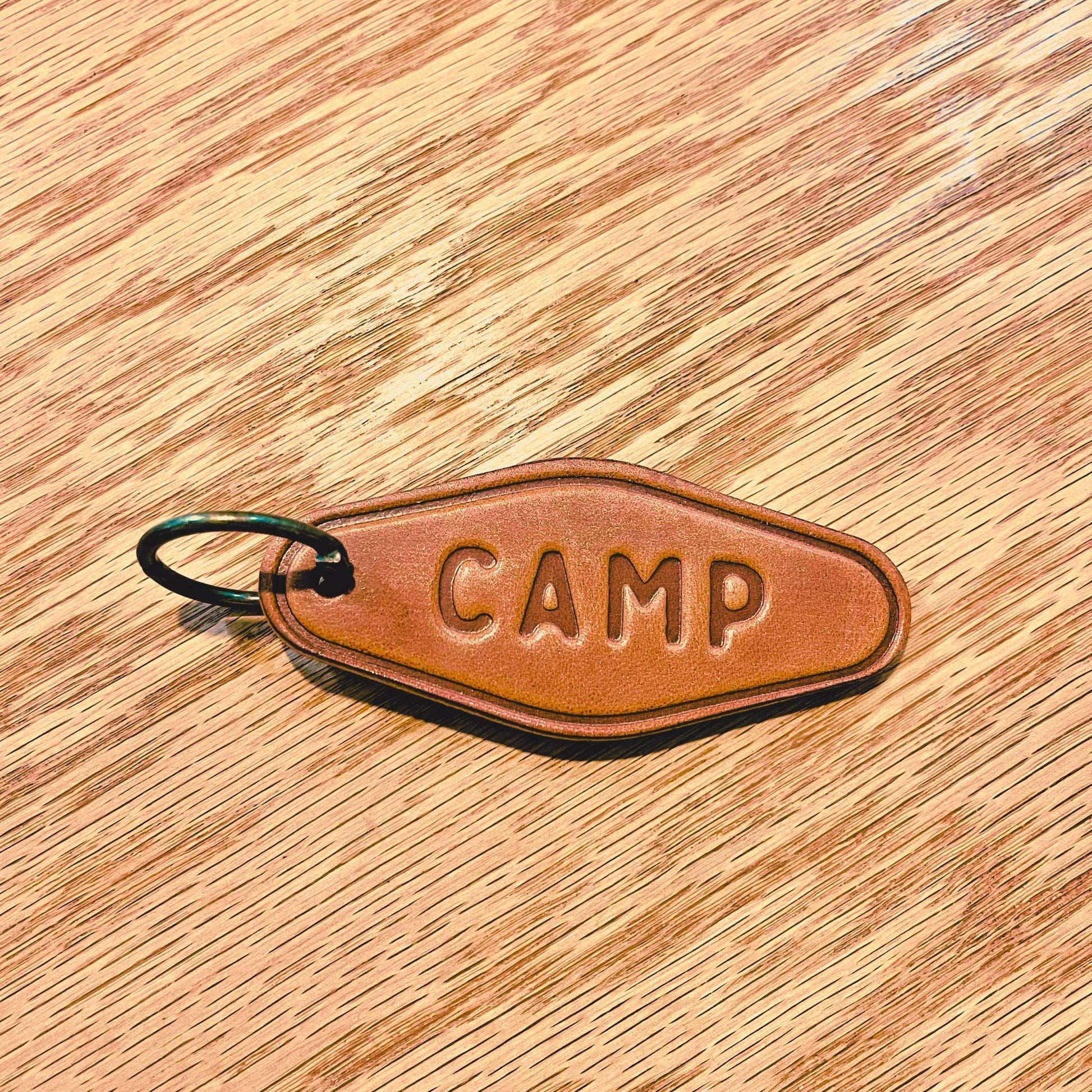 camp leather keychain cut and pressed by hand from some of the thickest and finest harness leather available.