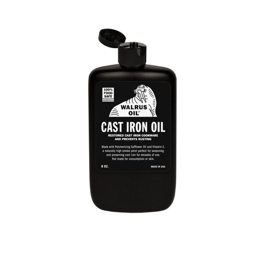 8 oz bottle of natural cast iron oil for restoring and maintaining