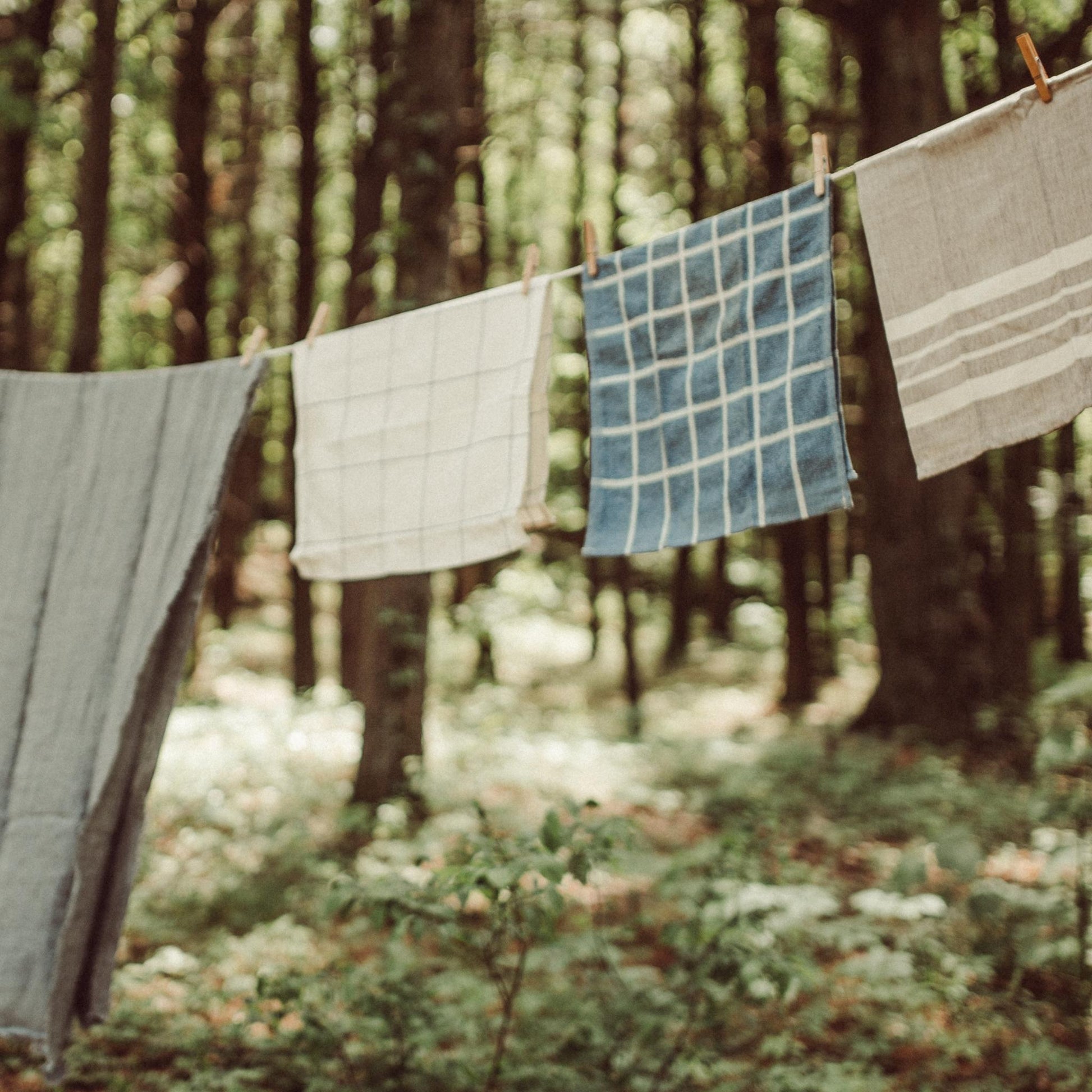 100% handwoven soft cotton kitchen towels on clothesline