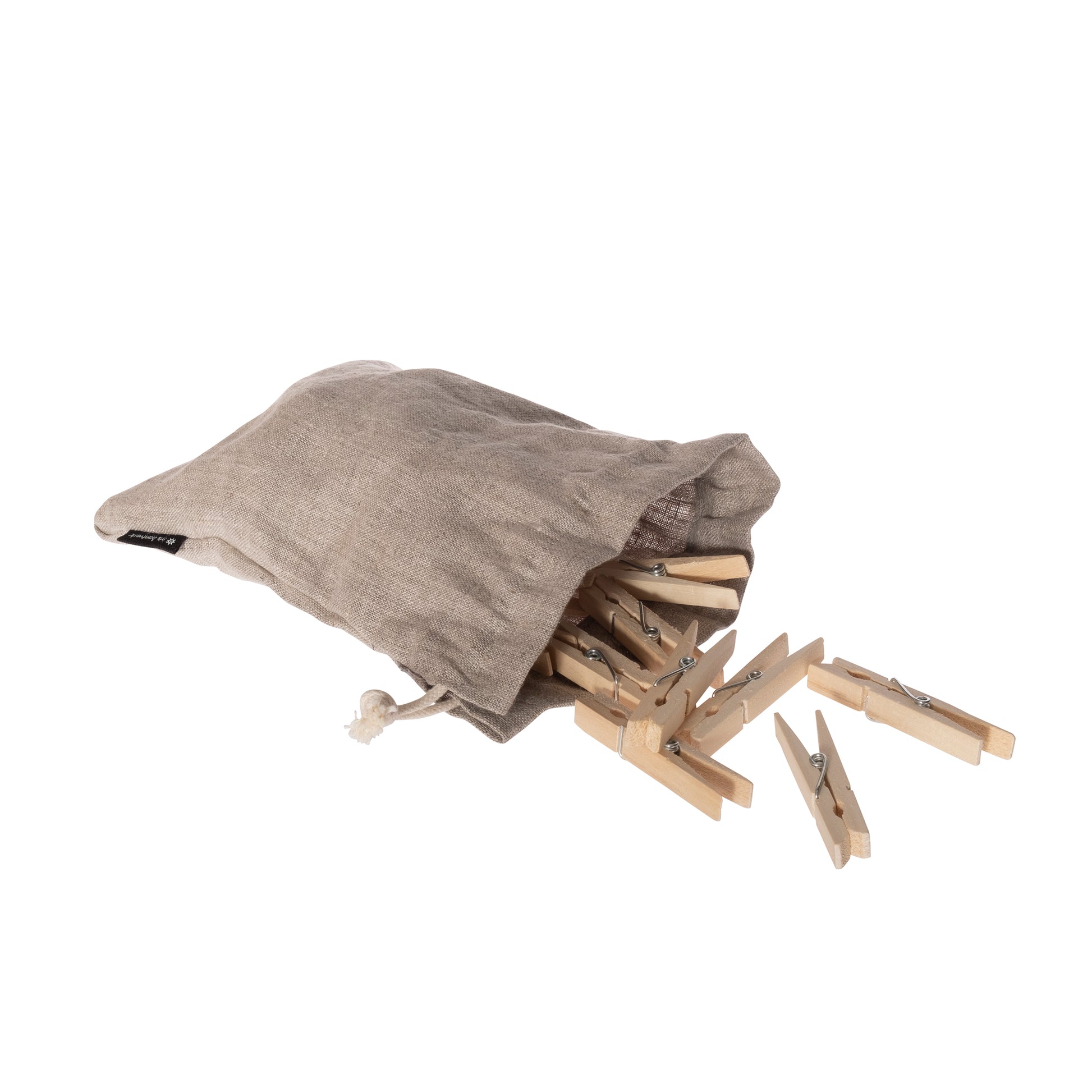 Linen drawstring bag with wooden clothespins spilling out