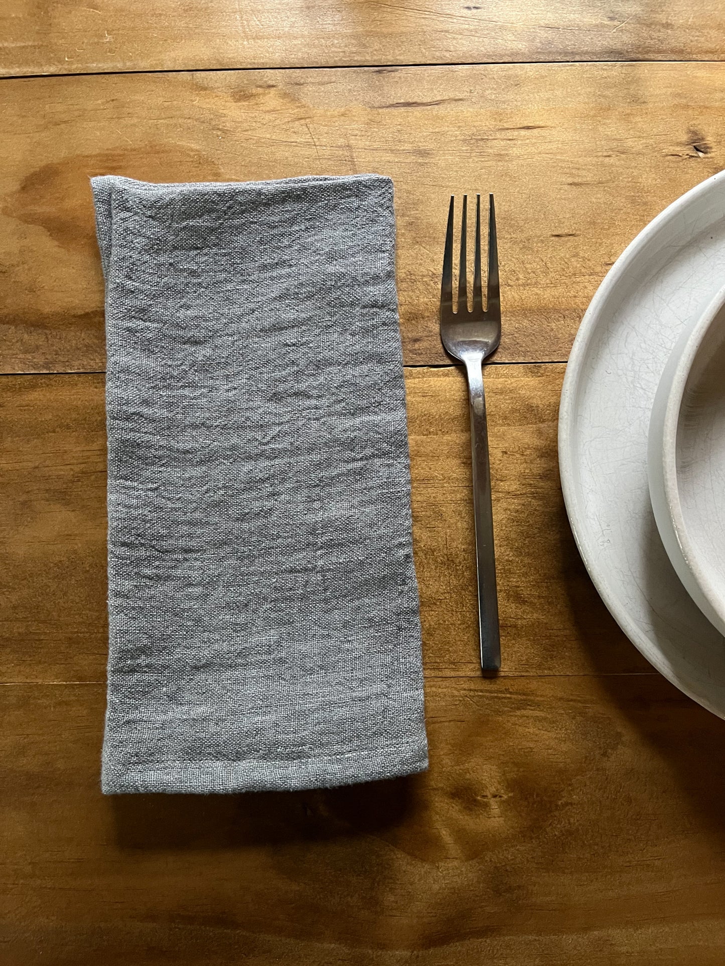 20-inch square stonewashed linen napkins with hemmed edge shown oyster gray