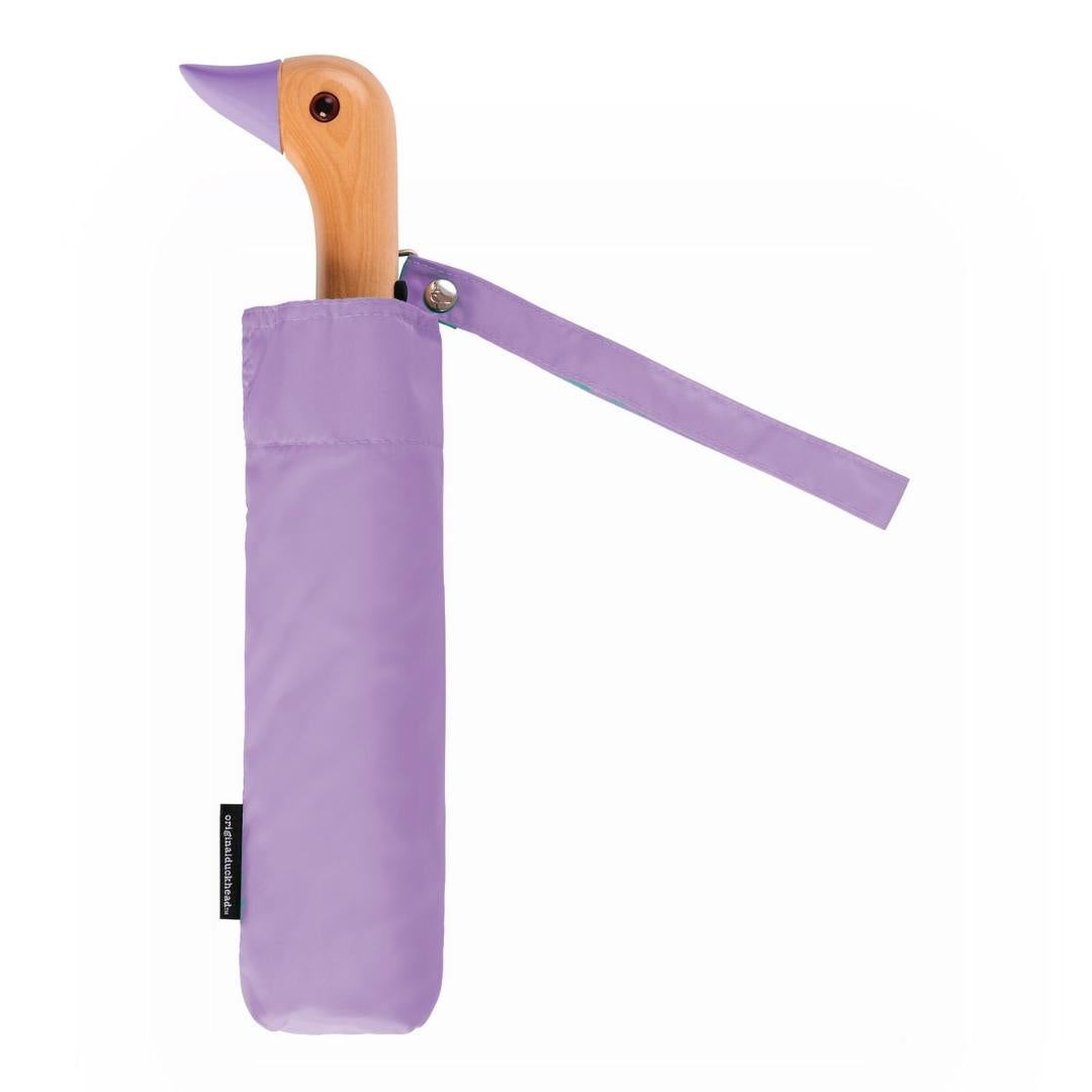 Compact umbrella in lilac with birchwood handle in the shape of duck head