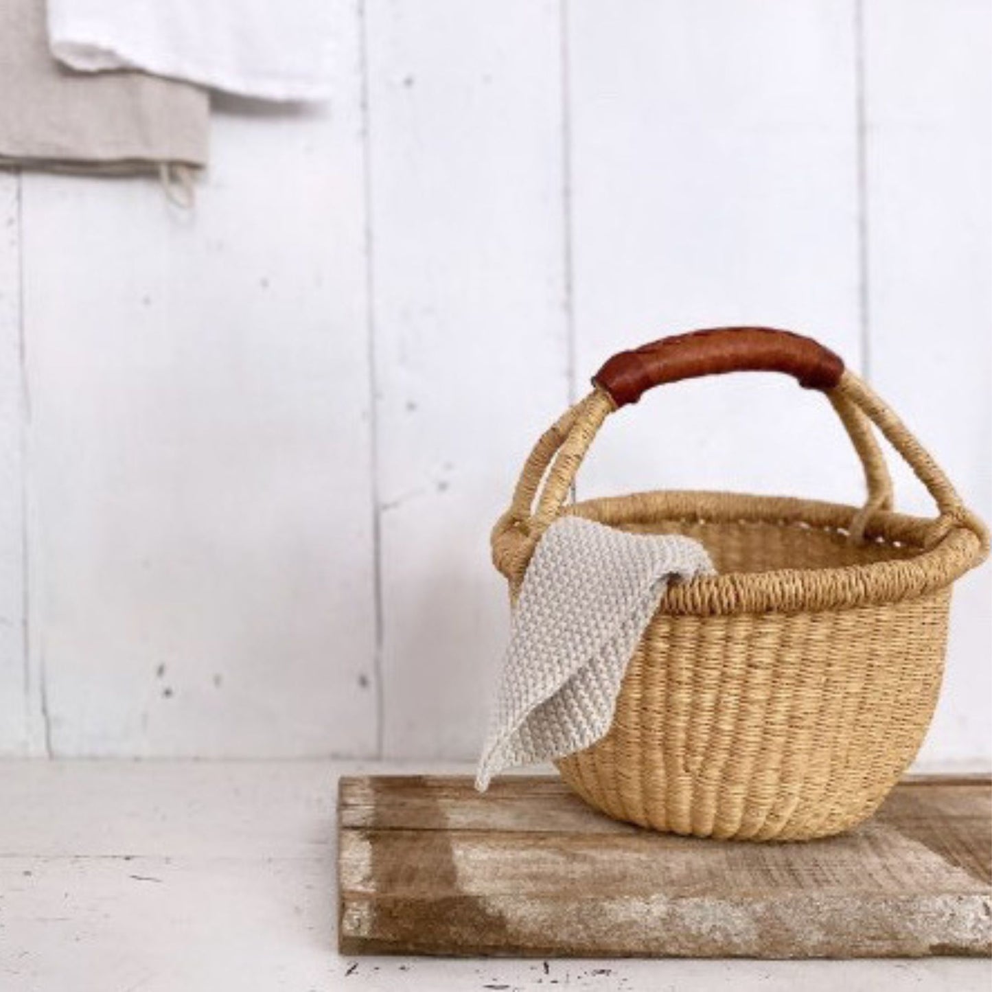 small basket with knitted cloth