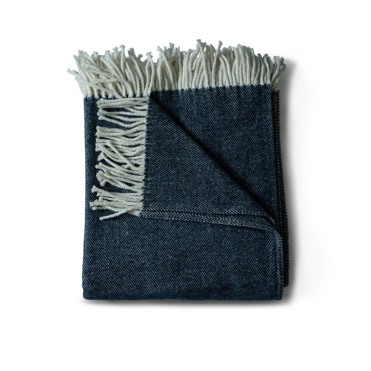 Brushed cotton throw blanket in dark navy blue herringbone pattern with cotton fringe  