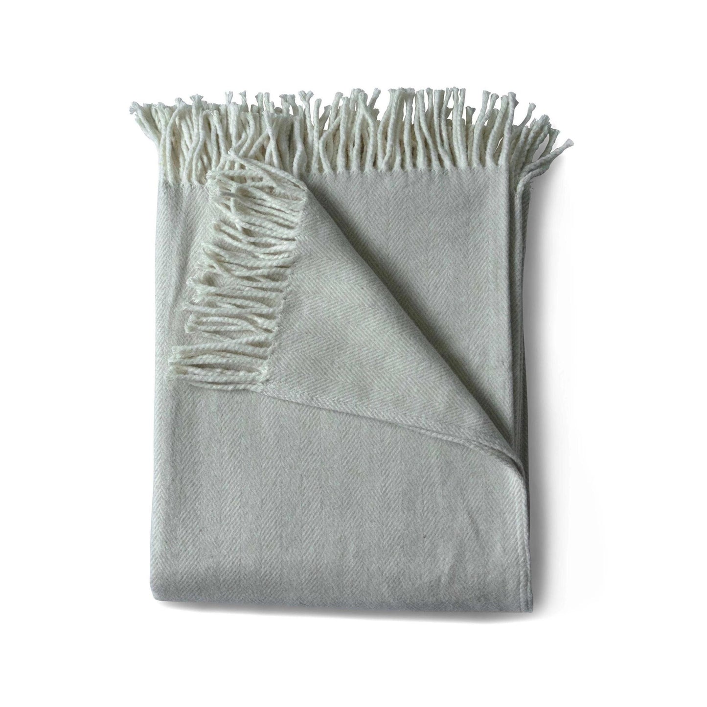 Brushed cotton throw blanket in oyster gray herringbone pattern with cotton fringe